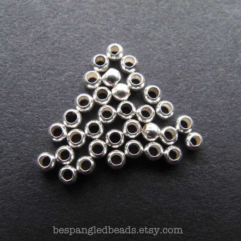50 Sterling Silver 2mm or 2.5 mm Tiny Round Spacer Beads, .9 1.2mm hole image 1