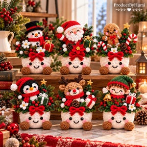 May include: Six crocheted holiday planters featuring a snowman, Santa, gingerbread person, penguin, reindeer, and elf. Each white planter has a smiling face and holds festive greenery, red berries, pinecones, and small gift boxes.