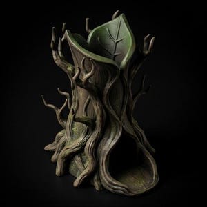 May include: A brown and green tree stump shaped vessel featuring textured bark details, protruding branch-like structures, and a hollow interior with a leaf-shaped opening at the top. The base includes a wide, arched opening resembling a hollow log.
