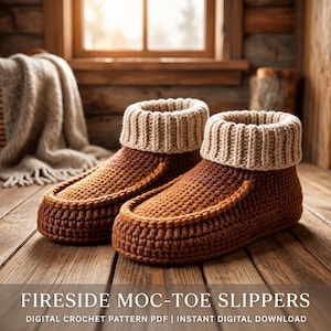 May include: A pair of brown crochet slippers with a moccasin-style toe and a beige ribbed cuff. The text on the image reads FIRESIDE MOC-TOE SLIPPERS DIGITAL CROCHET PATTERN PDF | INSTANT DIGITAL DOWNLOAD.