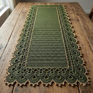 May include: A rectangular crochet table runner in a deep olive green colour. The centre features a dense, textured stitch pattern, while the edges are finished with an intricate, scalloped lace border trimmed in a thin, metallic gold thread.