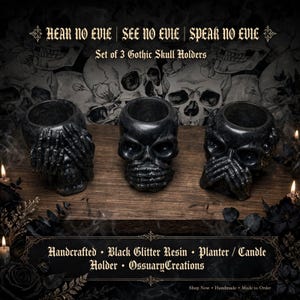 May include: A set of three black glitter resin skull holders featuring the Hear No Evil, See No Evil, and Speak No Evil motifs. Each skull has a hollow top for use as a planter or candle holder. The text reads Hear No Evil, See No Evil, Speak No Evil, Set of 3 Gothic Skull Holders, Handcrafted, Black Glitter Resin, Planter / Candle Holder, OssuaryCreations.