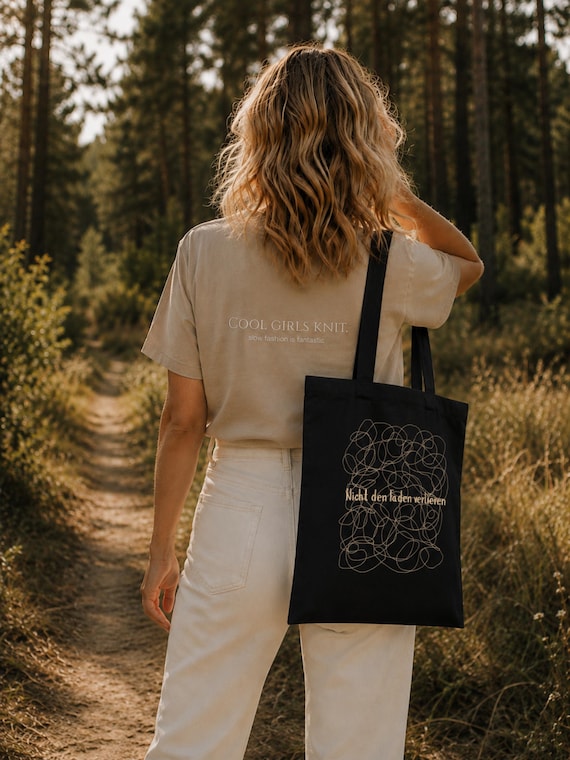 Stoffbeutel Geschenk aus Bio-Baumwolle für alle, die Handarbeit und Wolle lieben | Stofftasche in schwarz | Geschenke für Strickerin