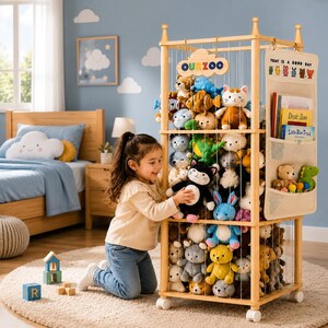 May include: A light-colored wooden rolling storage tower filled with various plush animal toys, featuring a sign that reads OURZOO and a hanging fabric organizer with the text TODAY IS A GOOD DAY and two children's books on the side.