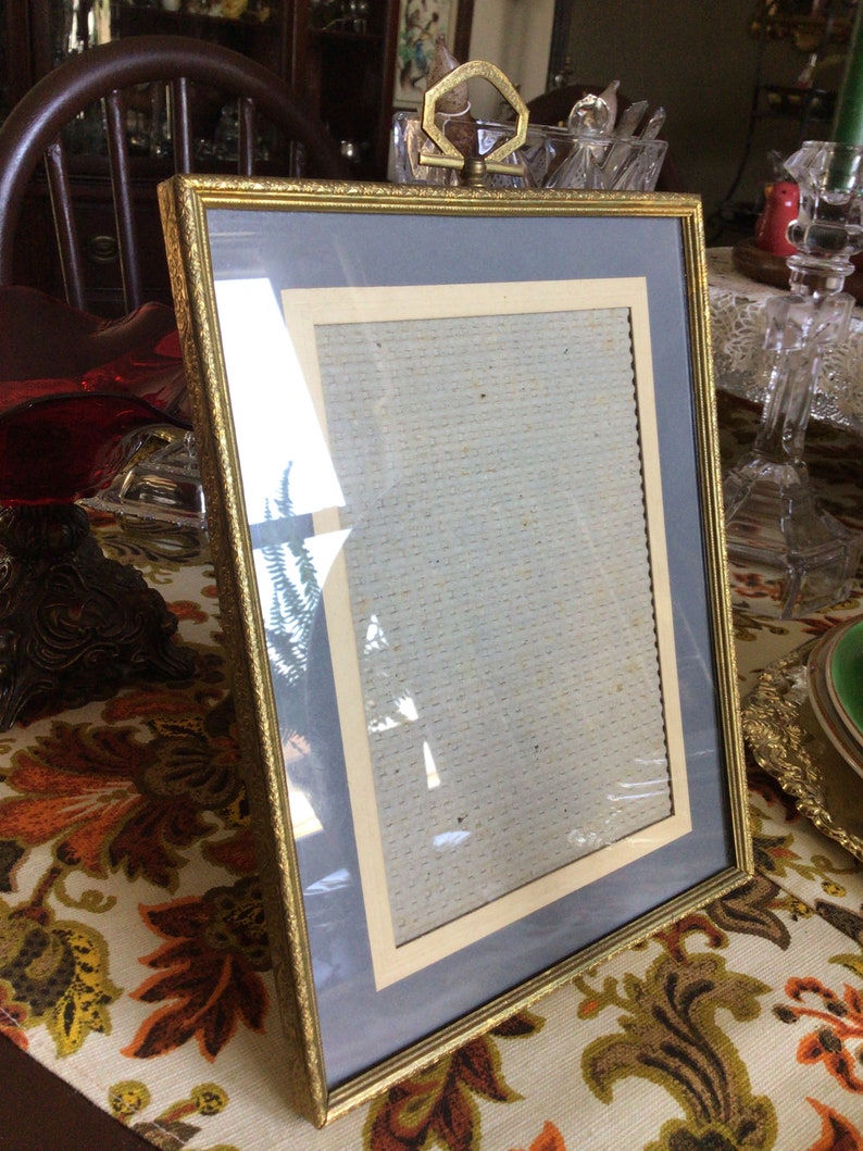 Old Tabletop Picture Frame with Brown Crushed Velvet Backing and Ornate Metal Frame and Glass