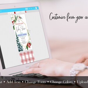 Peut inclure: Un &eacute;cran d'ordinateur affichant un mod&egrave;le d'invitation de f&ecirc;te pr&eacute;natale personnalisable sur le th&egrave;me de l'hiver. L'invitation pr&eacute;sente une illustration aquarelle d'un pin, de baies de houx et d'un cadre g&eacute;om&eacute;trique dor&eacute;. Le texte sur l'invitation indique "Greatest Gift Baby Shower" et "Madelyn Jackson".