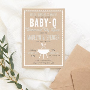Puede incluir: Una invitaci&oacute;n de baby shower de papel marr&oacute;n con texto blanco. La invitaci&oacute;n dice "Beers, Burgers & Brats! Please join us for a Baby-Q Barbecue & Baby Shower Honoring Madelyn & Spencer and Baby Jackson. Saturday, September 16th, 4 PM, 1234, City, State Zip. RSVP to 000 000 0000. Registered at Pottery Barn Kids."