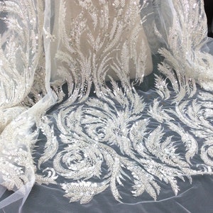 Perline d'argento, pizzo da sposa in tulle bianco di paillettes, tulle ricamato con filo d'argento, tessuto da sposa squisito