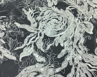 Bridal off white corded floral lace fabric with delicate sequins