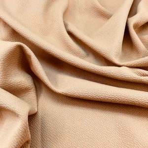 Beige Light stretchy material remnant fabric