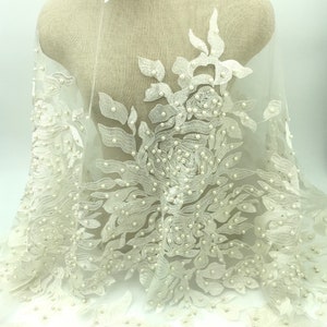 Off white lace, beaded pearl lace, remnant measures 50”x54”