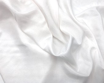 Tessuto strutturato bianco, materiale di cotone bianco, materiale bianco, tessuto per abiti
