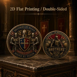 May include: Two circular metal coins with 2D flat printing and double-sided designs. The left coin features three armoured knights and a shield with the text BROTHERS BY BLOOD, UNITED BY CHOICE, and BOUND BY HONOR. The right coin shows a warrior with the text IN BATTLE IN BROTHERHOOD, BROTHERS, TOGETHER UNTIL THE END, WE STAND, WE FIGHT, WE PREVAIL.