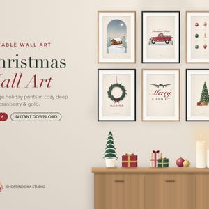 May include: A set of six framed wall art prints featuring Christmas themes including a snowy cabin, a red truck, holiday ornaments, a wreath, the text Merry & Bright, and a decorated Christmas tree, displayed on a wall above a wooden cabinet.