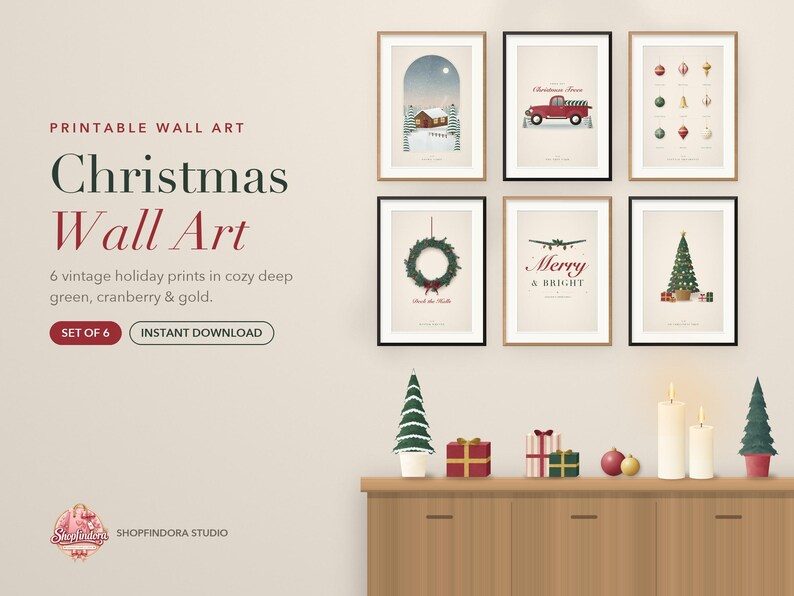 May include: A set of six framed wall art prints featuring Christmas themes including a snowy cabin, a red truck, holiday ornaments, a wreath, the text Merry & Bright, and a decorated Christmas tree, displayed on a wall above a wooden cabinet.