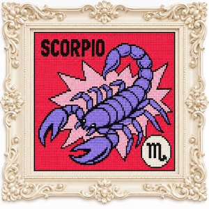 May include: A cross-stitch embroidery featuring a purple scorpion on a bright red background with a pink starburst shape behind it. The word SCORPIO is printed in black at the top left, and the Scorpio zodiac symbol is in a white circle at the bottom right.