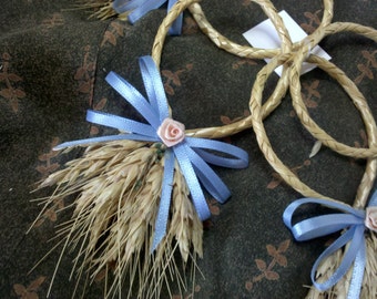 Wheat or grass and blue ribbon decorations