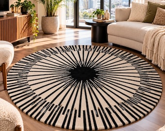 Alfombra redonda de lana y algodón tejida a mano con diseño de rayos de sol, alfombra geométrica bohemia en negro y marfil.