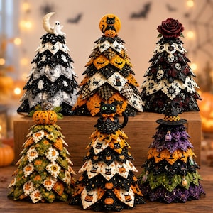 May include: Six decorative fabric trees featuring Halloween themes. The trees are constructed from layered, triangular fabric pieces in black, orange, green, and purple, adorned with patterns of ghosts, cats, pumpkins, skulls, and witch hats.