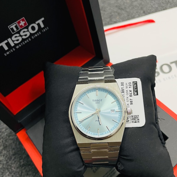 Reloj Tissot PRX Quartz con esfera azul hielo y caja de acero inoxidable de 40 mm, fabricado en Suiza.