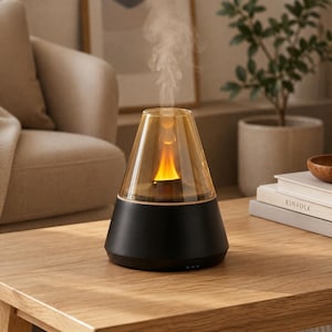 May include: A conical essential oil diffuser with a matte black base and a translucent amber glass top. The device emits a thin stream of mist from the centre, illuminated by an internal orange light that mimics the appearance of a flickering flame.
