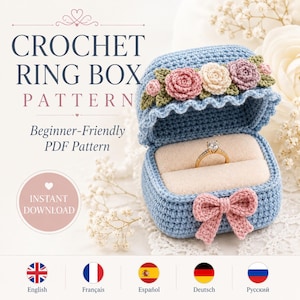 May include: A light blue crochet ring box with a hinged lid decorated with three small crocheted roses and green leaves. The box features a light pink crocheted bow on the front and contains a gold ring. Text reads CROCHET RING BOX PATTERN.
