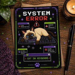 May include: A rectangular greeting card featuring pixel art of a Siamese cat lying on a computer keyboard. The black background displays the text SYSTEM ERROR, FATAL MEOWLFUNCTION, PURRGRAM NOT RESPONDING, CAT.IME HAS STOPPED WORKING, and CAT ON KEYBOARD.