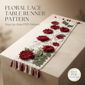 May include: A rectangular white crochet table runner featuring red floral motifs and green leaves, finished with alternating red and white tassels at the ends. The text reads: FLORAL LACE TABLE RUNNER PATTERN Step-by-Step PDF Pattern and INSTANT PDF DOWNLOAD.