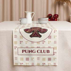 Mahjong table runner with bamboo tile pattern and Pung Club emblem