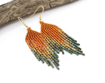 Small fringe beaded earrings, burnt orange, gold and green. Dangling autumn earrings.