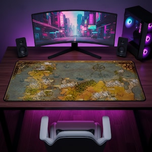 May include: A rectangular desk mat featuring a detailed fantasy map illustration with tan, brown, and blue tones. The map displays various geographical features including mountains, forests, and oceans, with a compass rose and the text Known World.