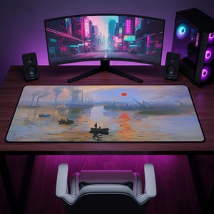 May include: A rectangular desk mat featuring a printed landscape illustration of a harbour at sunset with a small boat, ships, and a red sun. The mat is positioned on a wooden desk in front of a curved computer monitor, two speakers, and a PC tower.