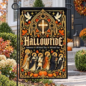 May include: A rectangular garden flag featuring a black background with gold gothic arches, a central cross, and two white doves. The text reads HALLOWTIDE, Halloween, All Saints' Day, All Souls' Day. Below are six figures in robes, pumpkins, and autumn leaves.