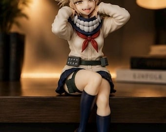 May include: A collectible anime-style figurine of a character with blonde hair in twin buns, wearing a cream-colored long-sleeve shirt, a dark blue pleated skirt, a red neckerchief, a dark utility belt, and dark blue knee-high socks with brown loafers.