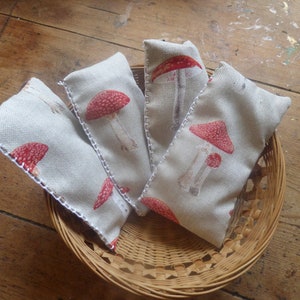 A linen lavender sachet with toadstool design