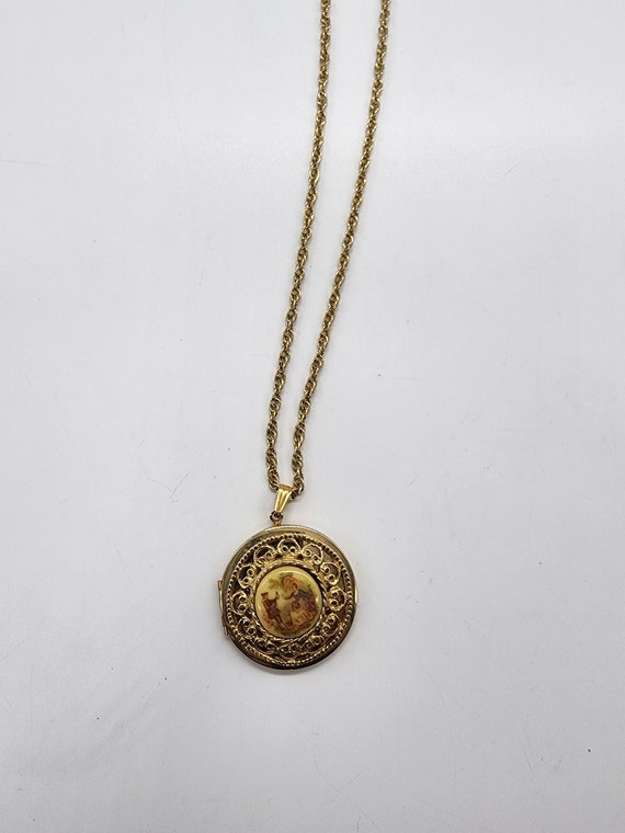 Vintage gold tone filigree locket necklace