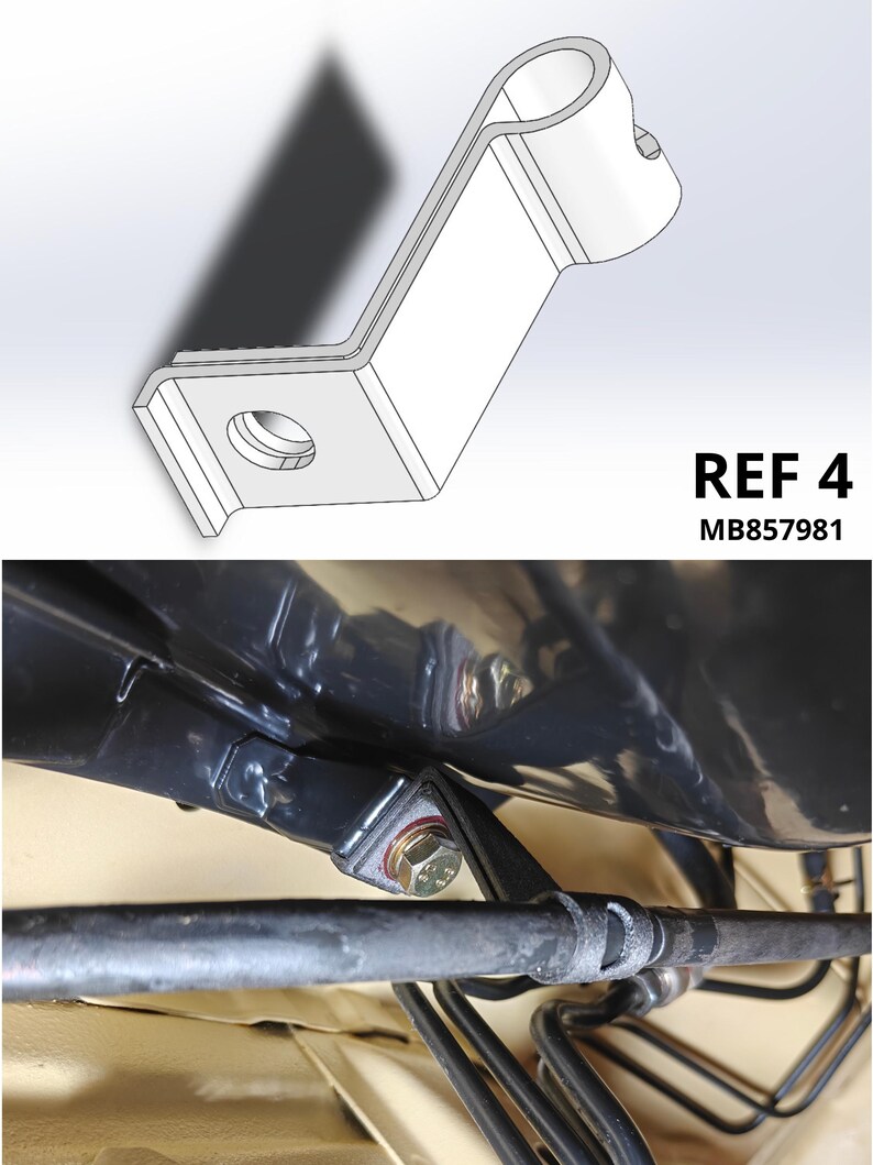 May include: A silver metal Z-shaped mounting bracket with a circular hole at one end and a curved pipe-holding section at the other, labeled REF 4 MB857981. The bracket is shown installed, securing a black pipe to a vehicle chassis component.