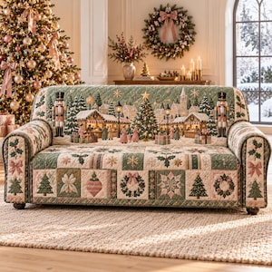 May include: A quilted sofa cover featuring a festive Christmas village scene with nutcrackers, pine trees, and street lamps on the backrest, and a patchwork pattern of wreaths, stars, and trees in shades of green, cream, and soft pink.