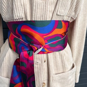 Obi fabric belt with very 70's patterns, very colorful vintage patterns: orange, purple, hot pink, green...