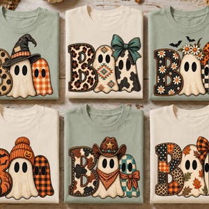Peut inclure: Six t-shirts arborant le mot BOO avec des illustrations de fantômes. Les motifs incluent des fantômes avec des chapeaux de sorcière, des nœuds, des chapeaux de cow-boy et des bonnets, ornés de motifs léopard, écossais et feuilles.