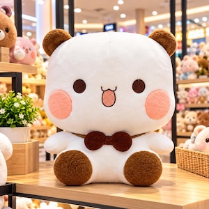 May include: A white plush bear toy with brown ears and feet, featuring a dark brown bowtie, round dark eyes, and pink circular cheeks. The bear has a small mouth with a visible tongue, a soft texture, and a rounded, seated body shape.