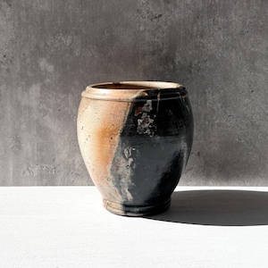 May include: A rustic wooden sign with the text "Welcome to our home" in white lettering. The sign features a distressed finish and a simple, inviting design, perfect for a front porch or entryway.