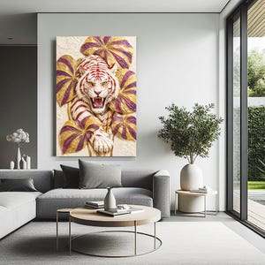 May include: A rectangular wall art print featuring a white tiger with red stripes, shown with its mouth open in a roar. The tiger is surrounded by large, stylised leaves coloured in shades of gold and deep purple against a textured cream background.