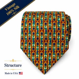 May include: A necktie featuring a repeating geometric pattern of vertical columns with alternating teal and yellow shapes, dark blue circles, and small diamonds set against a deep red background. The tie is made of 100% silk and labeled Structure.