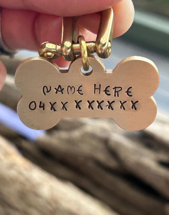 Bone Shaped Brass Dog Tag, Hand Stamped Pet ID with Name and Phone Number, photograph 1