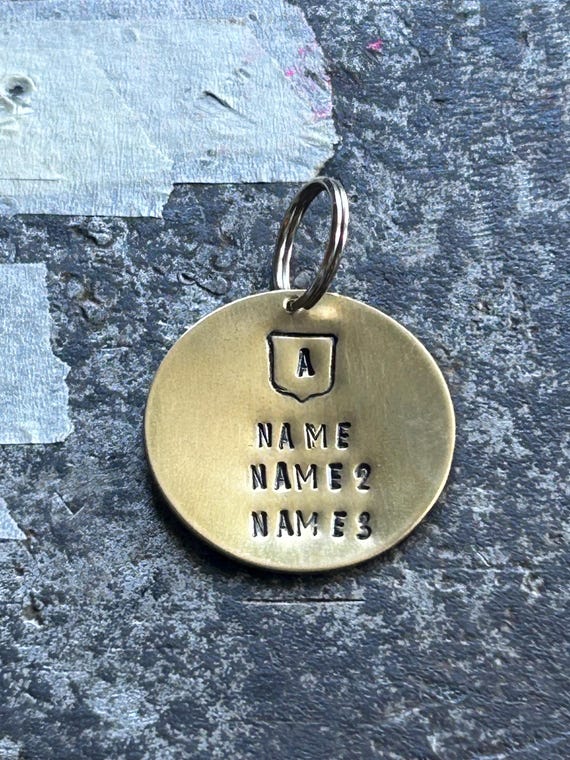 Personalized Brass Family Crest Keyring, Hand Stamped Surname Initial Shield (35mm), photograph 1