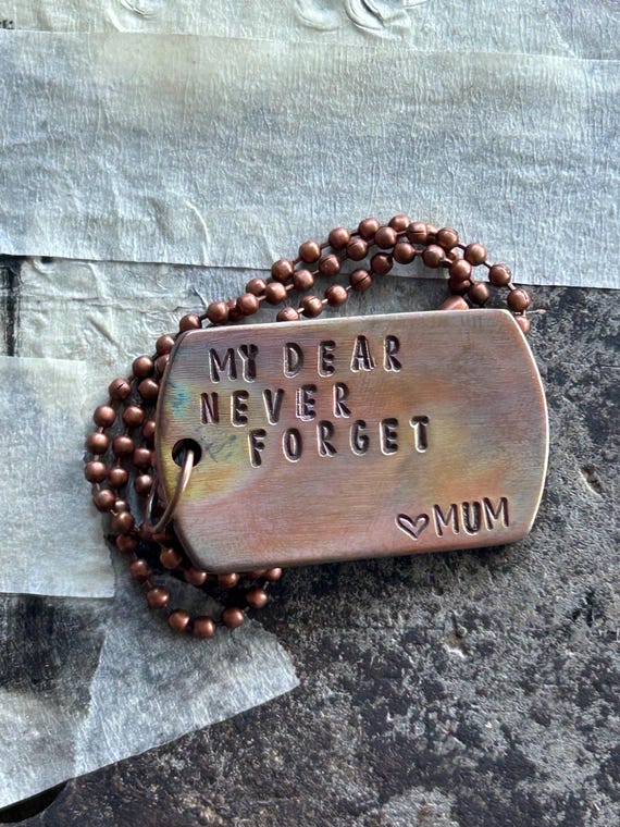 Personalised Copper Dog Tag Necklace, Rainbow Fire Patina, Custom Hand Stamped Message, Antique Copper Ball Chain, photograph 1