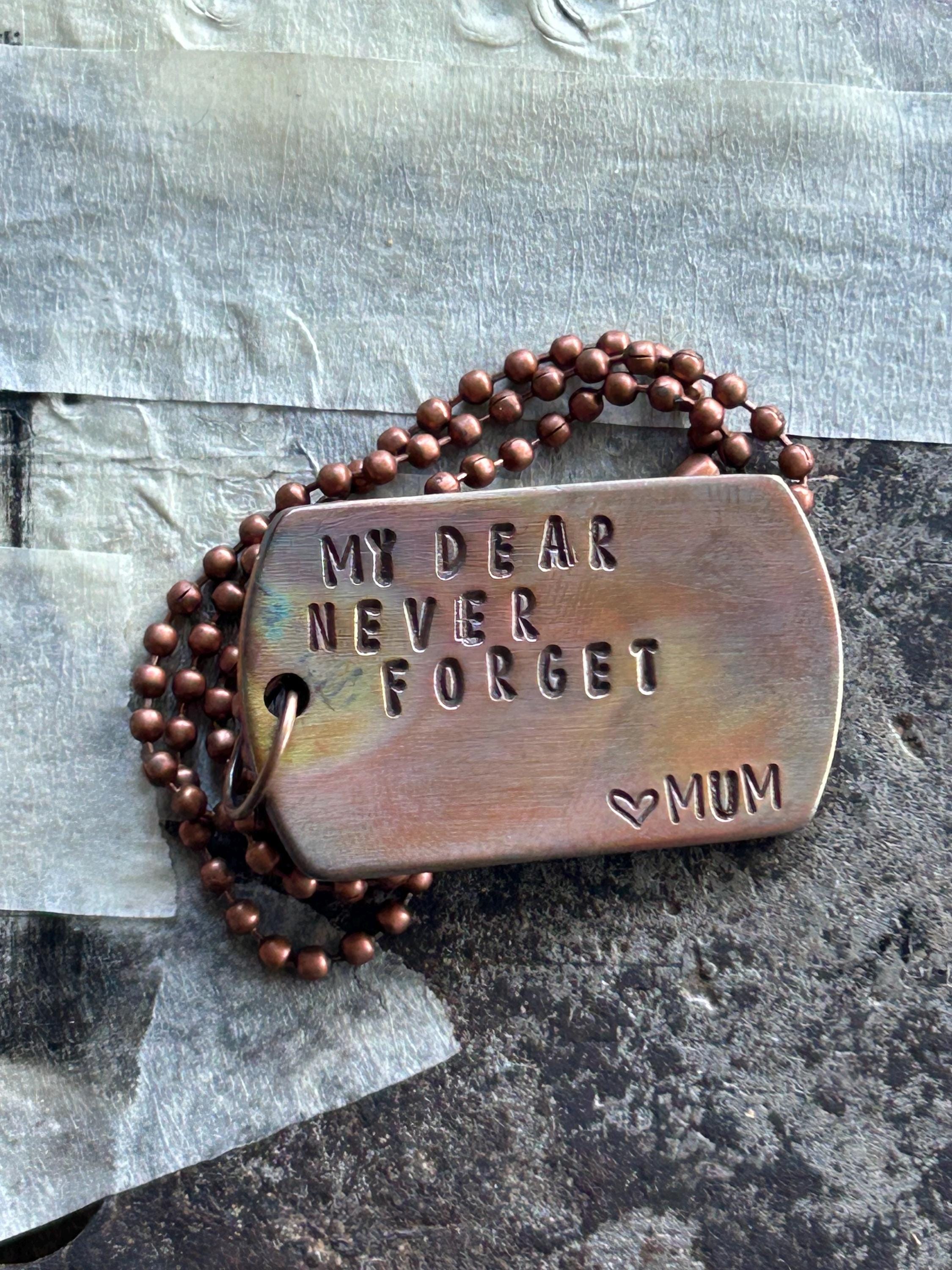 Personalised Copper Dog Tag Necklace, Rainbow Fire Patina, Custom Hand Stamped Message, Antique Copper Ball Chain, photograph 1