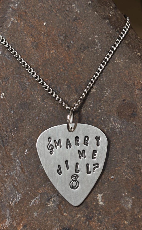 Personalised Guitar Pick Pendant Necklace | Hand-Stamped Proposal Gift (Alkeme Metal), photograph 1