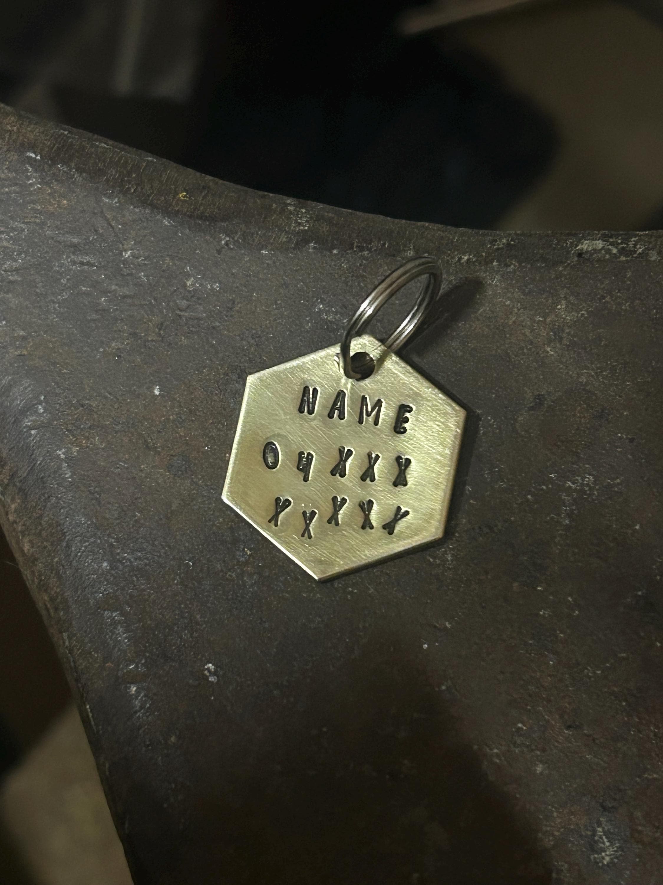 Hand Stamped Brass Hexagon Pet ID Tag, Custom Name & Phone Number, photograph 2